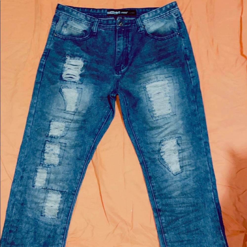 Square distressed blue jeans
